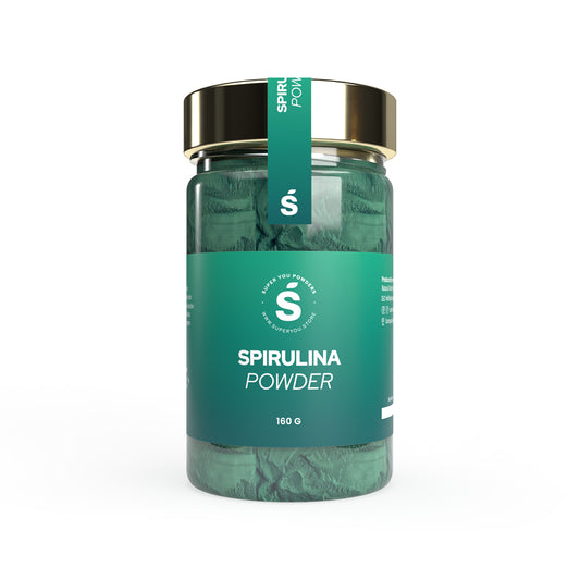 Spirulina powder superfood in a glass jar